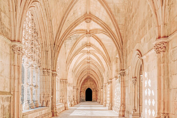 Gallery of the medieval cloister in Gothic and Manueline style of the Batalha monastery, Portugal
