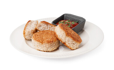 Plate with tasty meat cutlets and sauce on white background