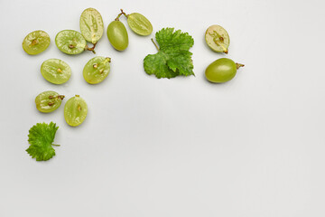 Fresh cut white grapes on grey background