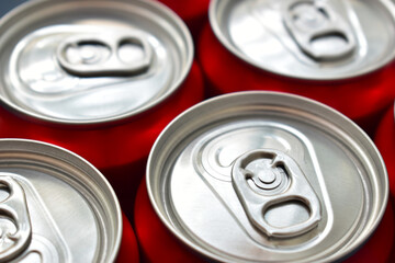 close up aluminium red cans soft drink, texture of metal for design