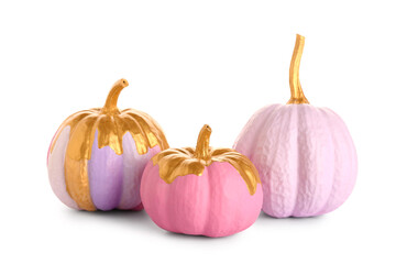 Different painted pumpkins on white background
