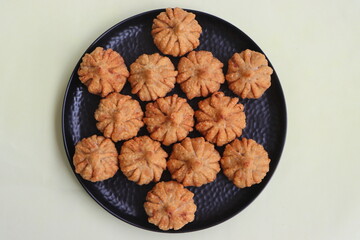 Modak- a traditional dish made during Ganpati festival in India, a sweet made with coconut, jaggery, and dry fruits stuffed inside the wheat dough