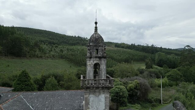 Aerial pan shot of Moeche Church built in the 15th century in the Ferrol Region, Galicia, Spain