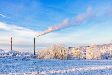 Frosty winter day with smoke from chimneys