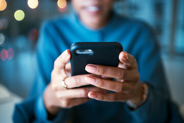 Night, hands and business person with phone in office for social media, text or chat communication. Working late, message and female entrepreneur with smartphone app for internet, search or reading