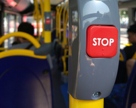a Red collor Bus bell button