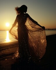 Silhouette Photograph of model woman on beach at sunset wearing golden sparkling dress, glittering shimmering, backlit sunset scene on the sand at the waters edge, dancing at sunset, twirling dress