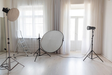 Fototapeta na wymiar Photographer's lighting equipment in a photo studio