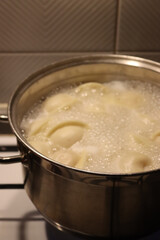Close-up of cooking italian Cappellaci pasta in boiling water