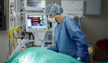 Bed, theatre or doctor with patient in surgery procedure or healthcare operation in hospital...