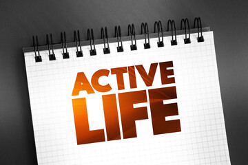 Active Life text on notepad, concept background