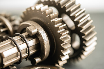 Fototapeta na wymiar Gear and cogs wheels, clock mechanism, brass metal engine industrial.