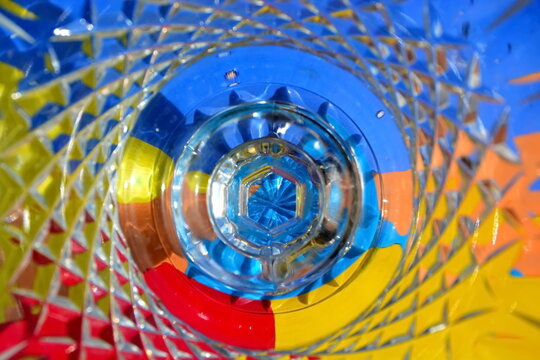 Abstract wallpaper. Geometric colorful shapes with through the geometric patterns surface of glass art