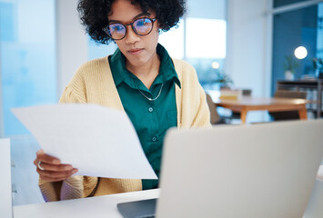 Woman, laptop and documents in finance, budget or planning strategy, investment or policy at home....