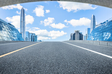 Shenzhen city skyline and clean asphalt road background