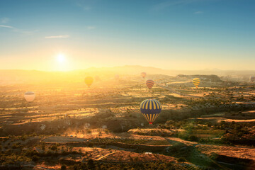 Hot air balloons flying over spectacular Cappadocia ,Turkey.