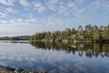 Lake Ragnerudssjoen in Dalsland Sweden beautiful nature forest pinetree swedish houses