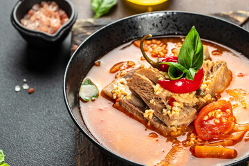 Tomato soup with bulgur and ribs. Concept healthy and balanced eating. place for text, top view
