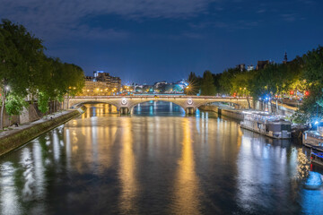 By the river Seine in Paris at night