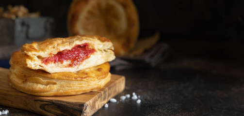 Rustico puff pastry from Lecce filled with stuffed with tomato, mozzarella and bechamel sauce