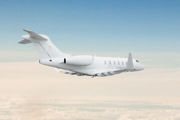 White luxury business jet fly in the air above the clouds