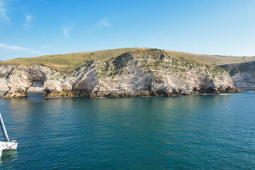 People are Enjoying Boat Ride at British Ocean of Durdle Door England Great Britain UK. Most...