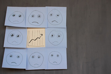 sad and up chart illustration on sticky notes