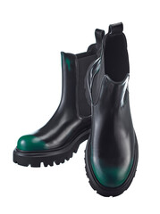 Beautiful pair of high demi-season boots made of black leather with a green spout, with a massive sole, isolated on a white background. - 661354078