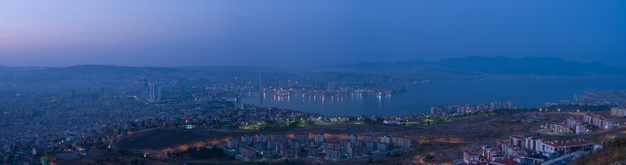 Panoramic view of the city of Izmir from the hill at dusk. Turkey 