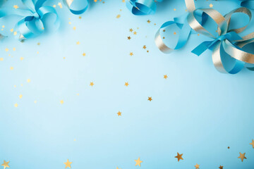 Gold ribbons and stars on a light blue background, with copy space, Party/ Celebration background