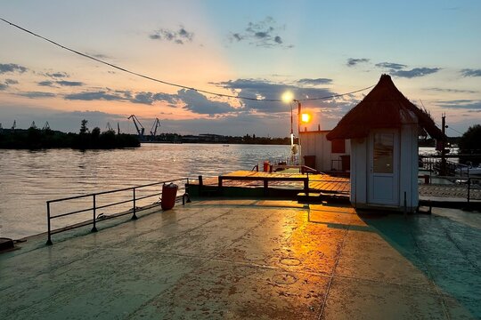 Sunset over a ferry pontoon across the Danube from Braila.