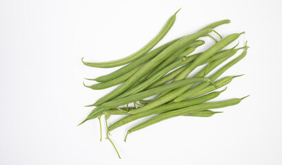 fresh green beans on white background