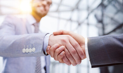 business partners shaking hands . concept of partnership