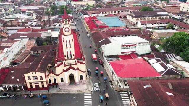 Drone shot of the St. John the Baptist Cathedral in Iquitos Square on a cloudy day in Iquitos, Peru