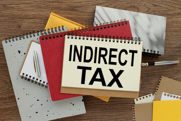 Indirect tax Top view, empty notepad and stationery on the table.