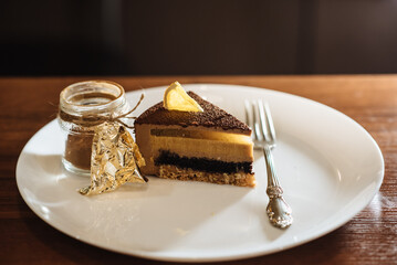 Caramel-orange-mousse cake with mirror glaze. Autumn cake. French