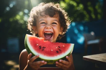 Foto op Aluminium Excited child holding a juicy watermelon slice in sunlight © Jan