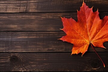 Naklejka na ściany i meble Autumn's Gentle Embrace: A Lone Maple Leaf on Rich Wooden Planks Showcasing Nature's Beauty. Generative AI