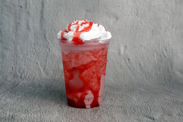 Freshly made strawberry flavored frappe