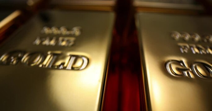 Stack of gold bars and financial concept. Investments in gold