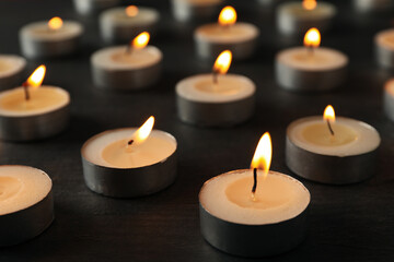 Fototapeta na wymiar Concept of sadness and sorrow - sorrow candles