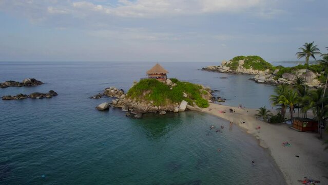 Drone flying towards Cabo de San Juan bungalow in Tayrona National Park