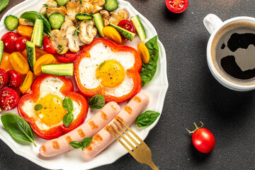 Breakfast sausages with fried eggs, roasted sausages, tomatoes, mushrooms and vegetables. banner, menu, recipe place for text, top view