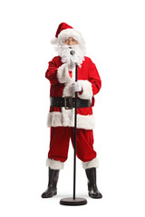 Santa claus with a microphone singing