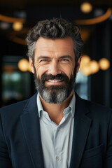 Obraz premium Portrait of happy middle aged businessman in suit.