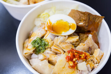 Steamed chicken fillet in take away bowl
