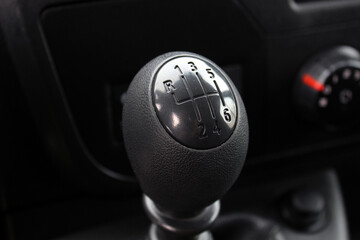 Modern Cargo Van Close up manual gearbox lever. Modern Cargo Van dashboard. Cargo Van interior....