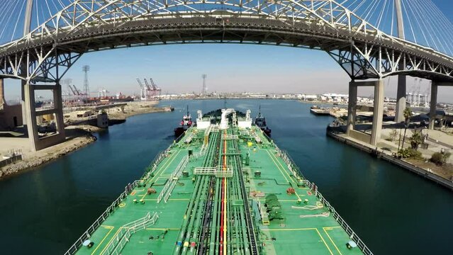 Timelapse oil tanker bow berth long Beach Los Angeles tug boat summer sunny day