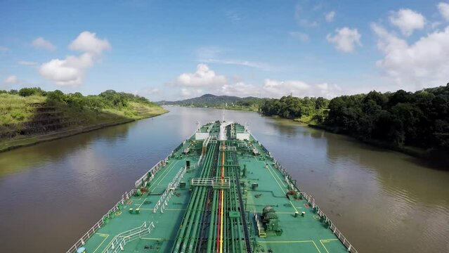 Timelapse oil tanker bow transit panama canal crossing Miraflores locks sunrise