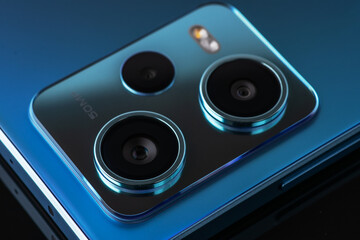 Fototapeta premium Smartphone triple camera image with selective focus